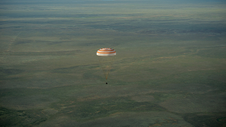 Illustration for article titled Watch a Soyuz "Soft Landing" from Gentle Detachment to Brutal Controlled Crash